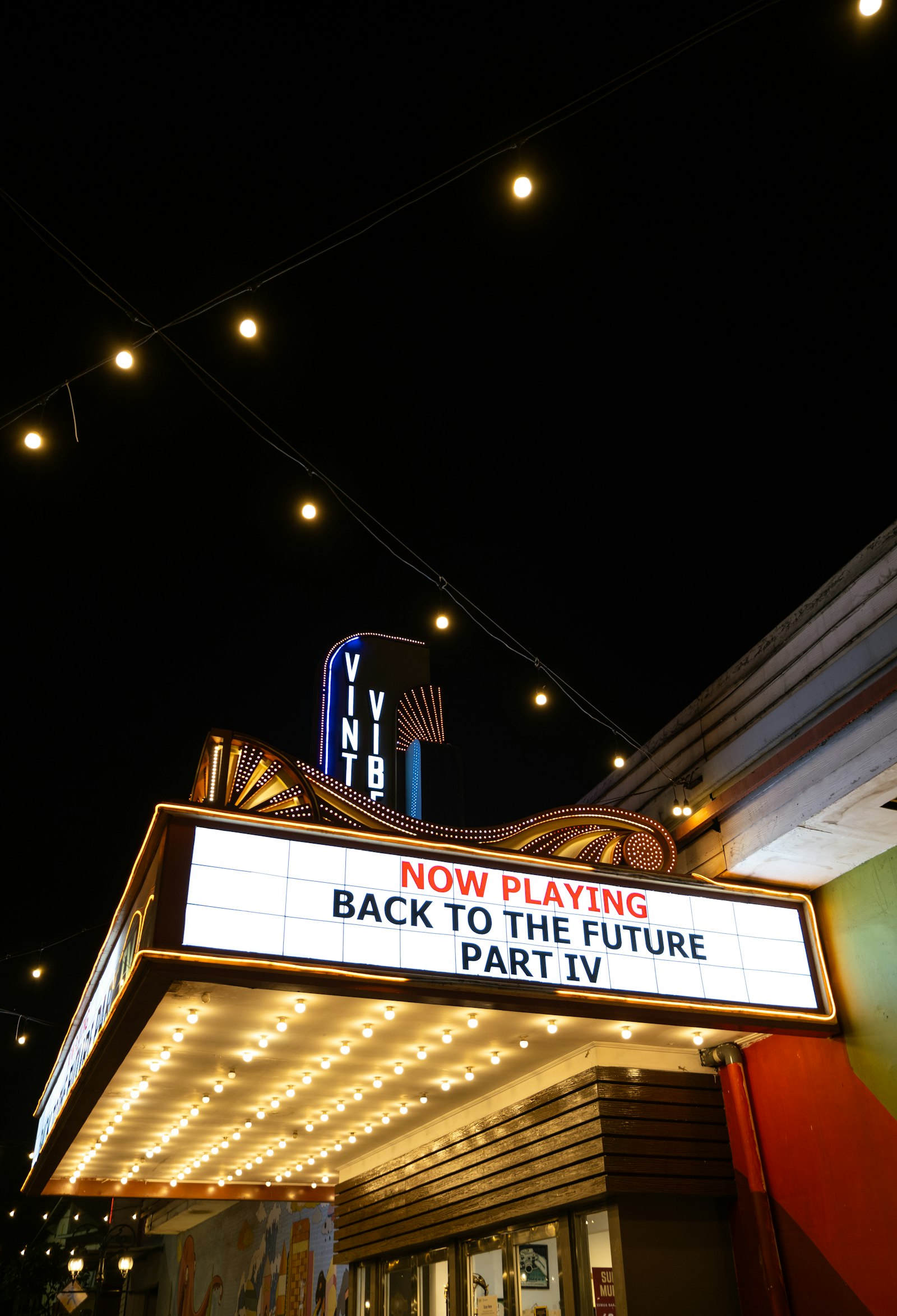 A Broadway theater marquee lit up at night